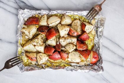 grilled potatoes on a piece of foil