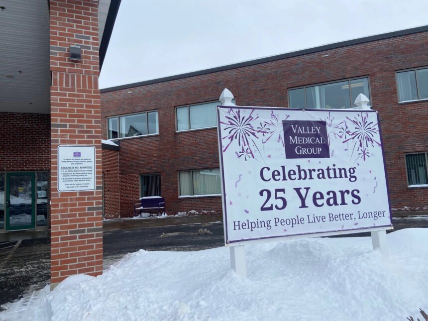 The exterior of a medical clinic with a sign reading "Celebrating 25 years"
