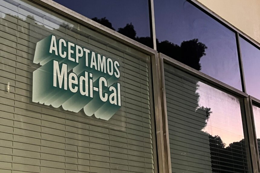A sign printed on a window reads "Aceptamos Medi-Cal."