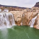 double waterfall of Shoshone falls cascading into a pool