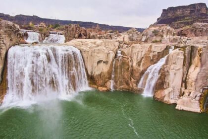 double waterfall of Shoshone falls cascading into a pool