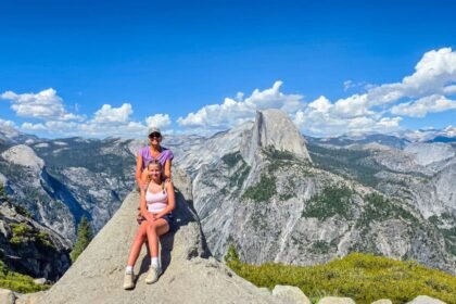 mother and daughter posing at glacial overlook
