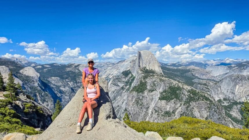 mother and daughter posing at glacial overlook