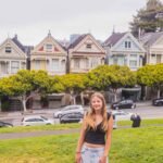 girl in front of painted ladies