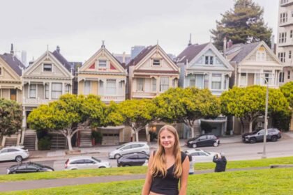 girl in front of painted ladies