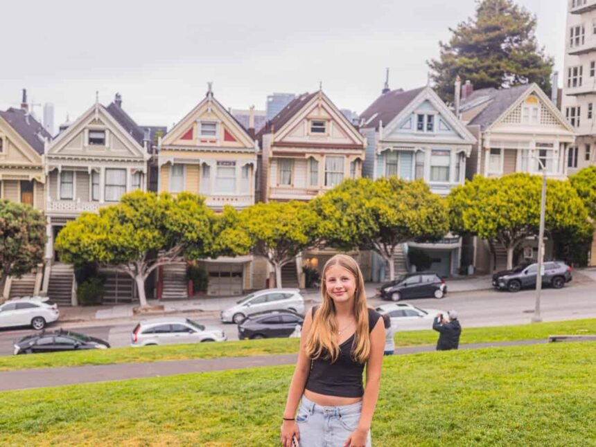 girl in front of painted ladies